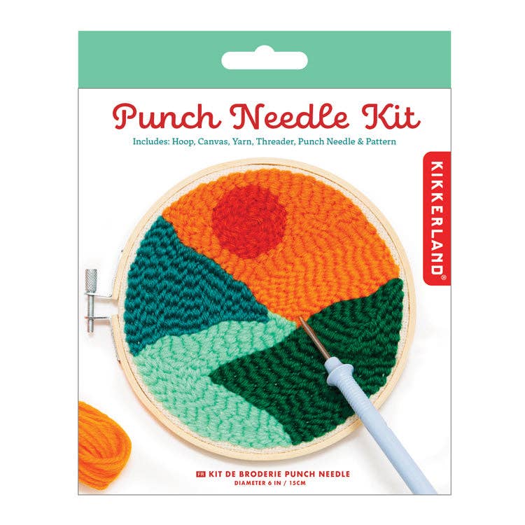 Punch needle kit packaging with colorful needlepoint design and Kikkerland branding.