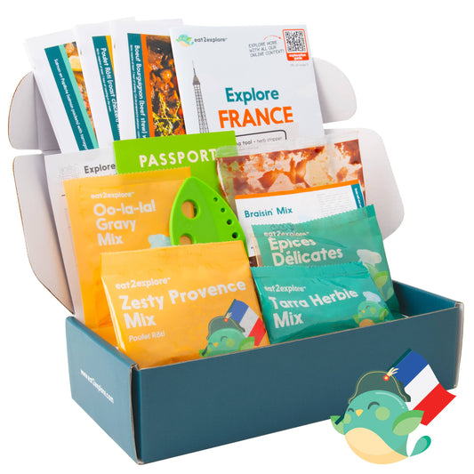 Display of zesty seasoning mixes with a 'Explore France' theme.