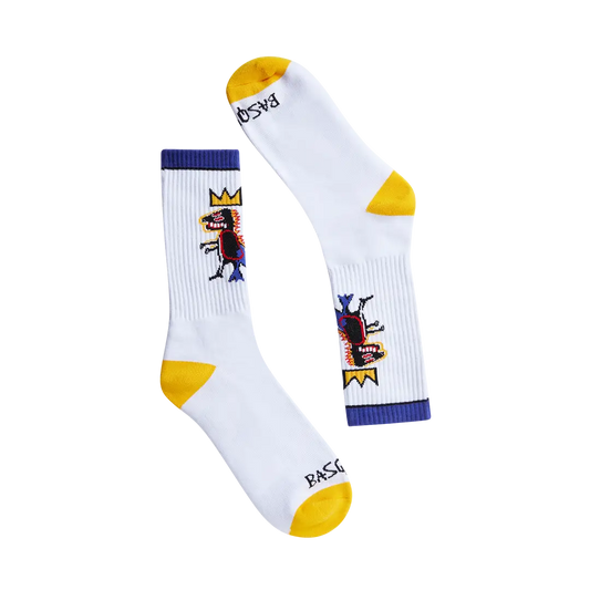White socks with colorful designs and yellow accents on a white background