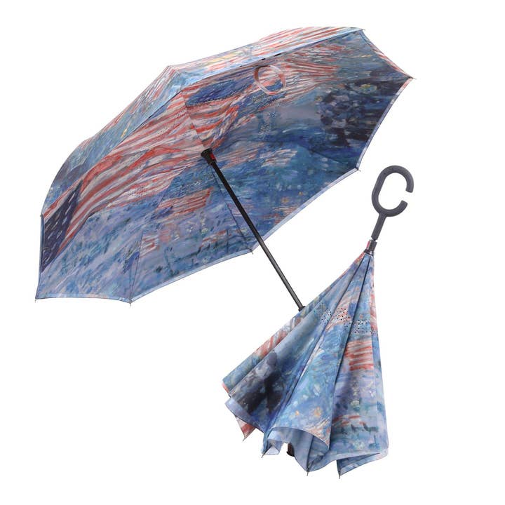 Inverted umbrella with a colorful design on a white background
