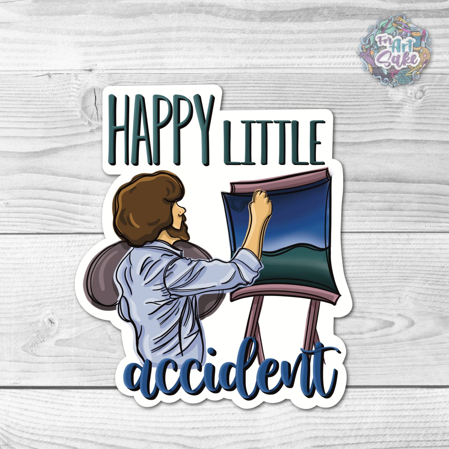 Sticker with illustration of a person holding a painting and text 'Happy Little Accident' on a wooden surface.