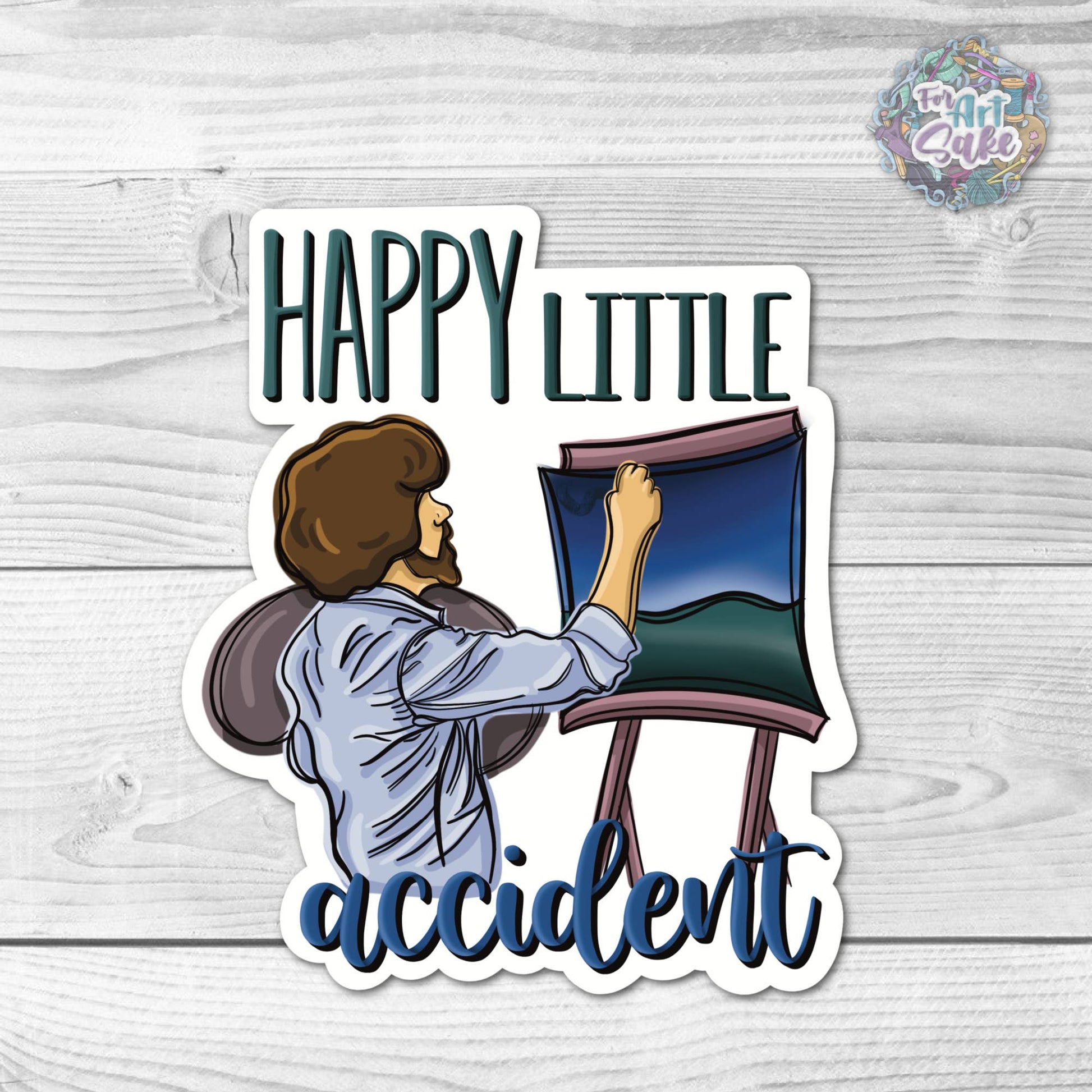 Sticker with illustration of a person holding a painting and text 'Happy Little Accident' on a wooden surface.