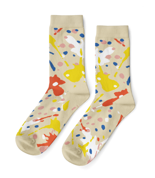 Beige socks with colorful abstract pattern on a white background