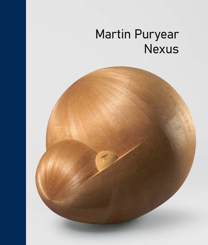 Wooden sculpture titled 'Nexus' by Martin Puryear on a blue and gray background