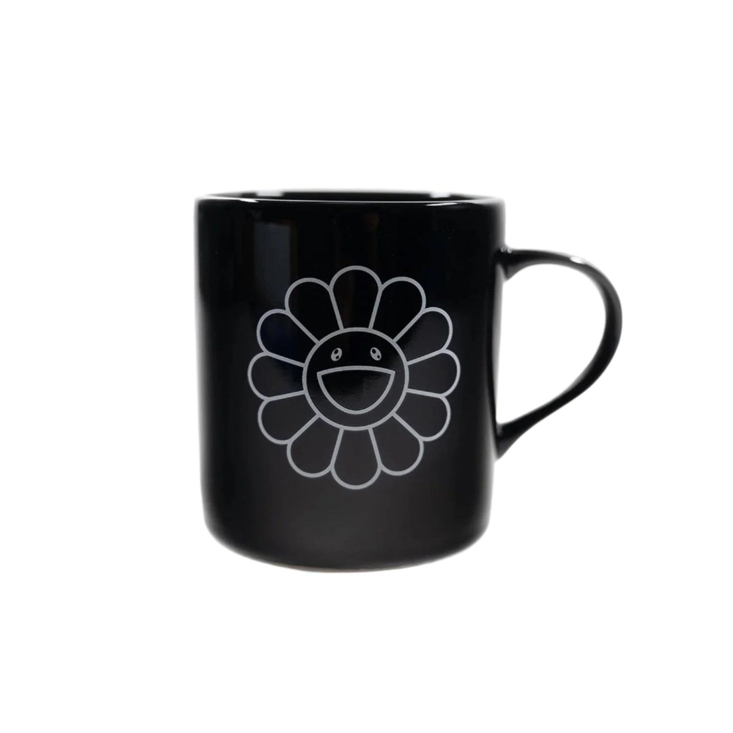 Black mug with a white flower design on a white background