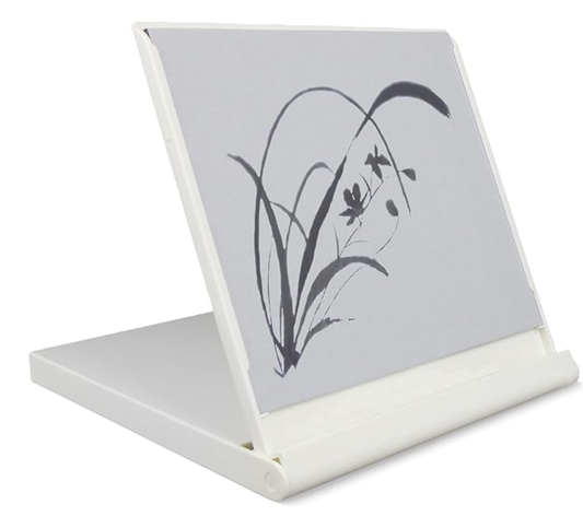Small white stand with a gray surface featuring a black floral design on a white background