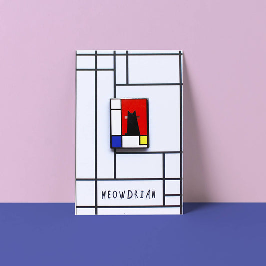 Decorative wall art with geometric design and 'MEOWDRIAN' branding on a pink and blue background